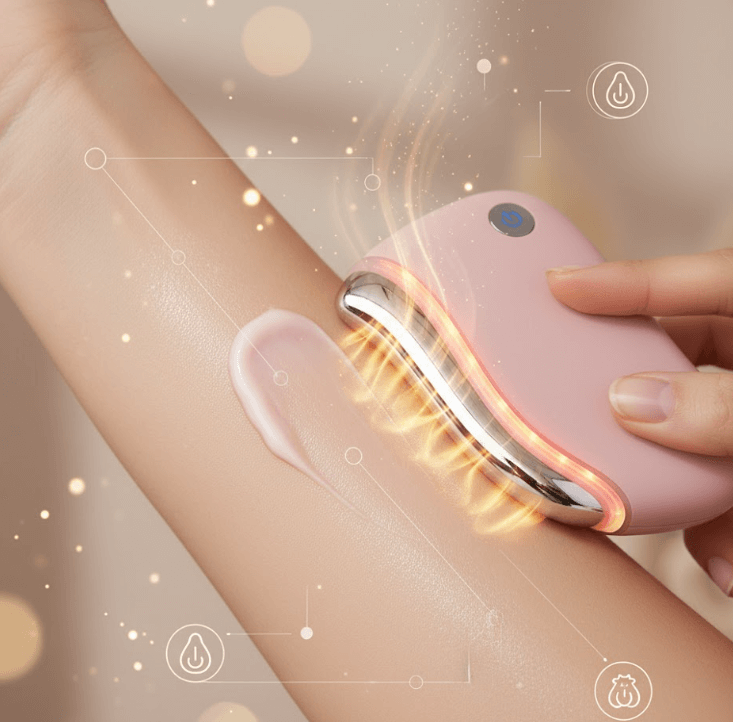 Le NanoSculpt™ rose poudré en action sur la peau, démontrant la chaleur thérapeutique (42°C) qui maximise l'absorption des sérums et crèmes.